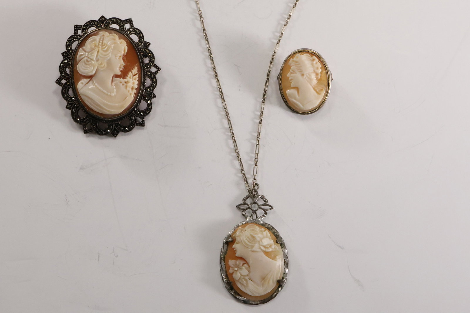 [3] Vintage Sterling Silver Cameo with Marcasites Victioran Maiden 1 3/4 in. x 1 1/2 in.; marked 800: [3] Vintage Sterling Silver Cameo with Marcasites Victioran Maiden 1 3/4 in. x 1 1/2 in.; marked 800 Athena Cameo 1 in. x 3/4 in.; Sterling Silver Athena Cameo Necklace on a 14K White Gold 16 in. Chai