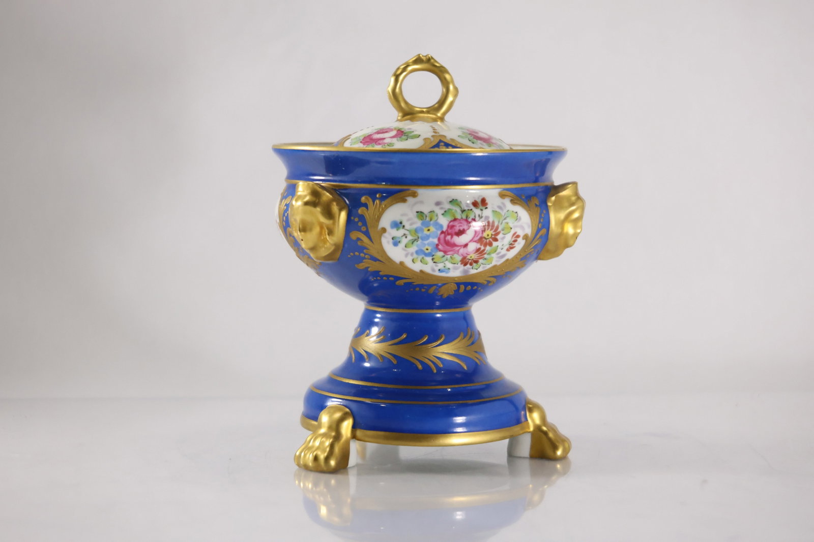 Serves Style, France, Porcelain Covered Urn, Blue with Gold Gilt, Footed, Hand Painted Flowers: Serves Style, France, Porcelain Covered Urn, Blue with Gold Gilt, Footed, Hand Painted Flowers. size: 8 in. height x 7 in. wide