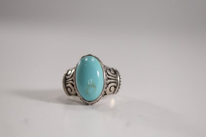 .925 Sterling Silver with Turquoise , Raised Stone with Beading and Carvings Ring Size 9 , 1 in. x 3