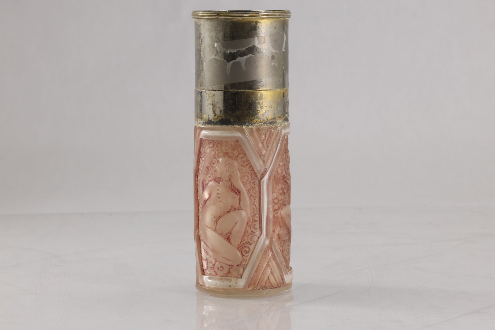 RENE LALIQUE CORDAY PARIS " ART DECO GLASS SCENT BOTTLE / ATOMIZER, NUDES: RENE LALIQUE CORDAY PARIS " ART DECO GLASS SCENT BOTTLE / ATOMIZER, NUDES. size: 5h x 3w ; three paneled nude female figures in various poses decorated red patinated glass under a metal pump mechanism