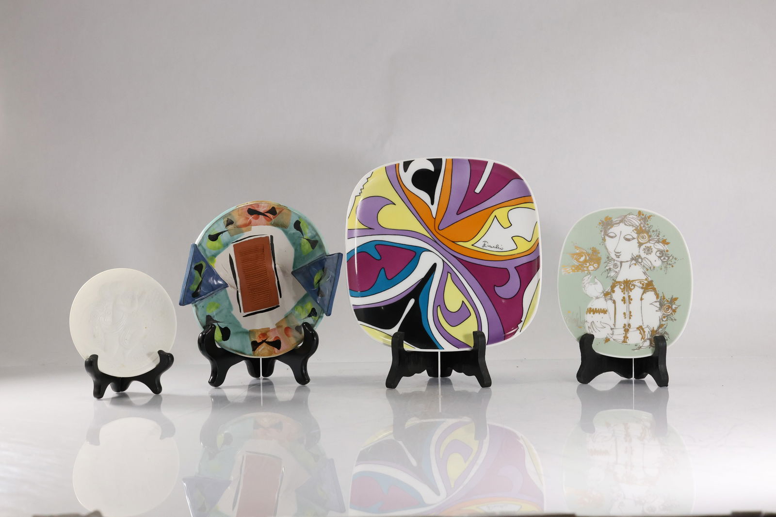 [4] Rosenthal 2 Plates Bjorn Wiinblad; 1 Emilio Pucci, 1 Art Pottery Lynn Bonde: [4] Rosenthal 2 Plates Bjorn Wiinblad; 1 Emilio Pucci, 1 Art Pottery Lynn Bonde size: 2.5h x 8.5w