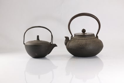 2 Tetsubin, traditional Japanese cast iron kettles, signed on base
