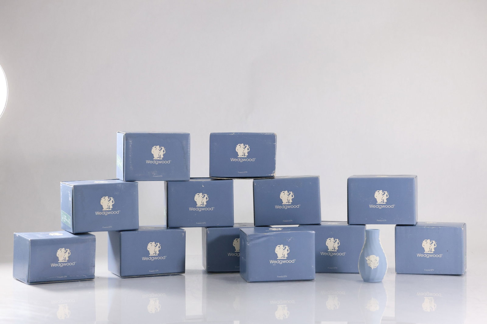 12 Matching WEDGWOOD Table Top Bud Vases with individual boxes included: 12 Matching WEDGWOOD Table Top Bud Vases with individual boxes included. size: 3 H 1.5 W , 12X