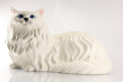Large White Ceramic Cat with Blue Eyes, 10 in. height x 16 in. length
