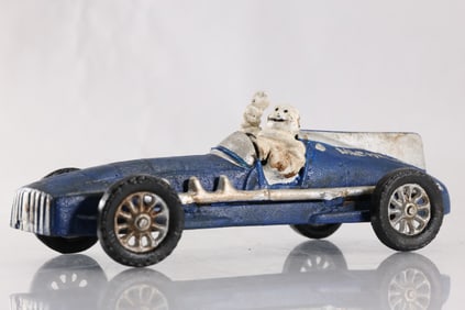 marked Hubley 1934, Cast Iron Blue Race Race Car with Michelin Man in Original Paint 10 in. length