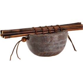 Untique Raft Zither sounded by the bare fingers, reeds tied to a gourd resonator