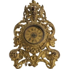 Antique Western Clock  Co. Cast Iron Victorian Shelf Mantle Clock Ornate Cherub Crest 11 in. height
