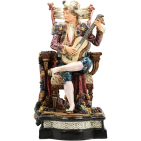 Majolica French Glazed Pottery Figure of a Seated Man Playing a Guitar. 16 in. height x 8 in. wide