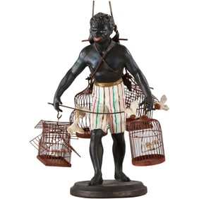 Blackamoor Bird Seller, Cast Metal Original Patina Finsh, 15 inches height x 10 in. wide