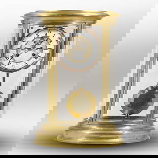 French oval brass four glass panels Crystal Regulator Train Station Mantel Clock. Open Escapement: French oval brass four glass panels Crystal Regulator Train Station Mantel Clock. Open Escapement movement, Key and Pendulum. 18 in. height x 11.75 in. wide size: 18h 11.75w S:C