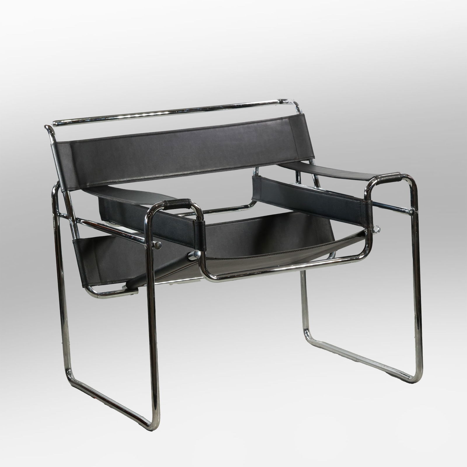 Mid-Century Modern Marcel Breuer B3 Wassily Chair: Mid-Century Modern Marcel Breuer B3 Wassily Chair. Mid-Century Modern Marcel Breuer B3 Wassily Chair. Chrome plated tubular steel, black leather. The iconic B3 tubular chair was first designed in 1925