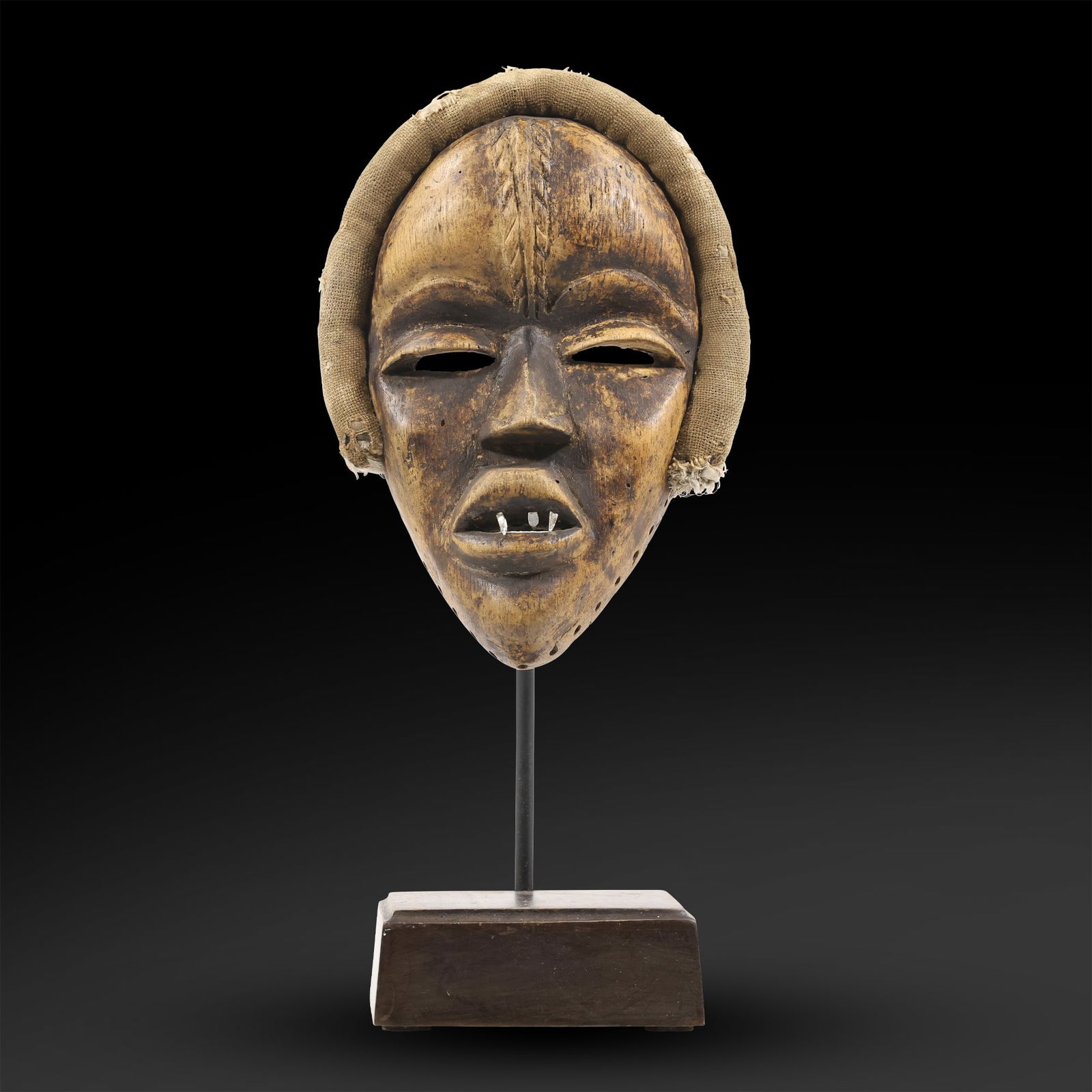 African Antique Dan Hand Carved Wooden Mask on a Display Stand 16 in. height: African Antique Dan Hand Carved Wooden Mask on a Display Stand 16 in. height. size: 16h 5w S:D