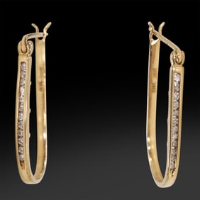 marked WIC 14K Gold and 12 Diamonds Each Elongated Hoop Earrings 1.9 dwt, 1 1/8 in. x 3/4 in.