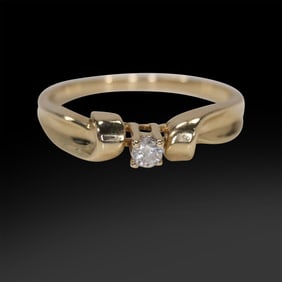 marked OTR 10K Gold Diamond Engagement Ring Size 7, approx. .15 ct, 3/4 in. x 1/8 in.