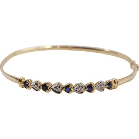 10K Gold Ruby and Diamond Bangle 2.1 dwt., 2.5 in. diameter