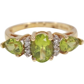 14K Gold Peridot [3] and 4 Diamonds Ring Size 6.5 , 2 dwt., 7/8 in. x 1/4 in.
