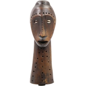 African tribal art, specifically a carved wooden head 12 inches height x 3.5 in. wide