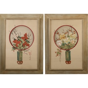 pair of framed Chinese silk paintings, each featuring a floral arrangement within a circular design