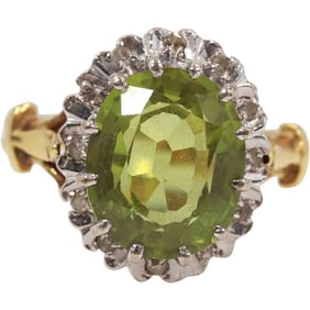18K Gold with Oval Emerald Surrounded by Diamonds Ring Size 6, 3.3 dwt, 3/4 in. x 3/4 in.