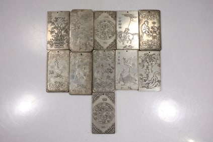 Eleven(11) Antique Chinese Silvered Scroll Weights