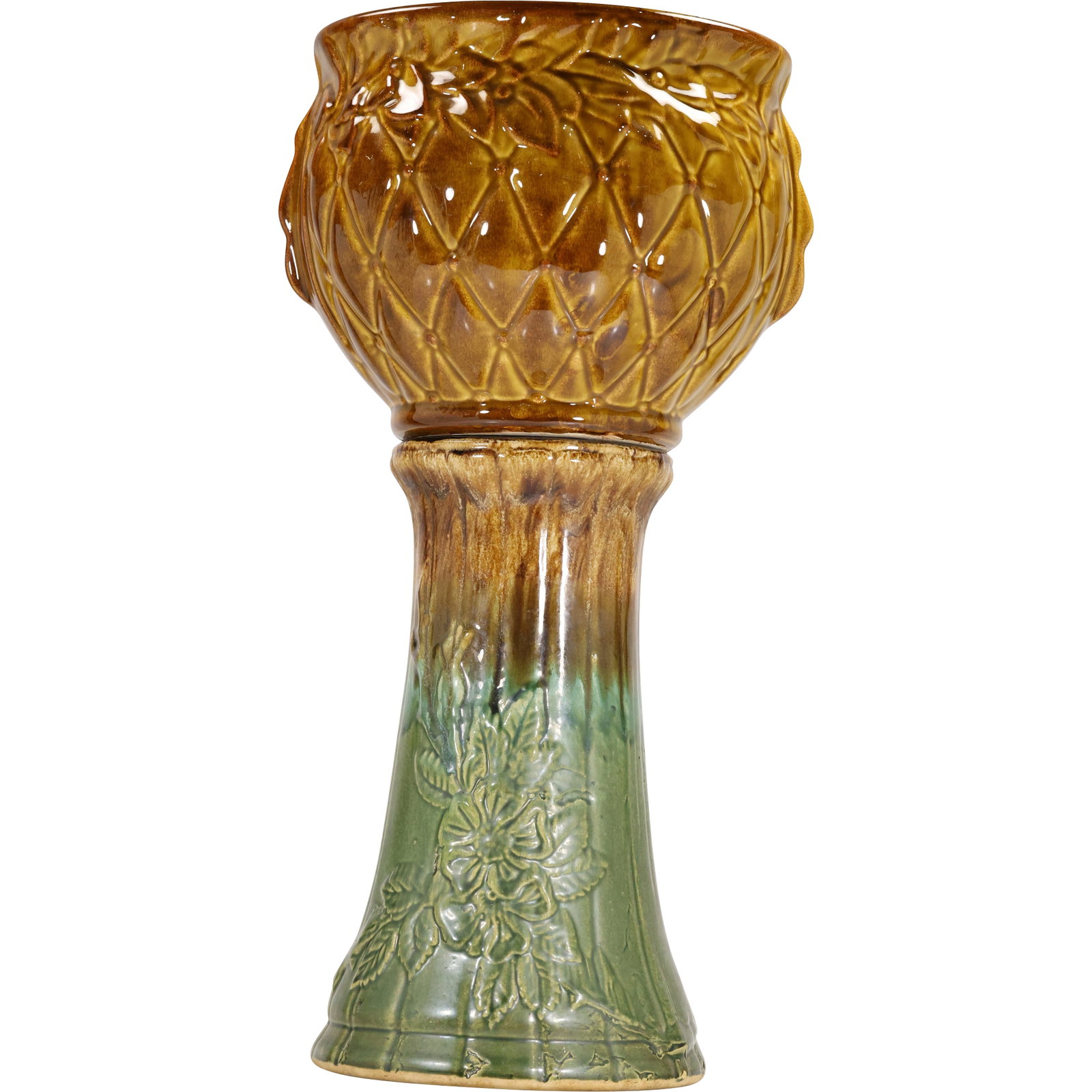 Majolica Jardiniere with Pedestal – Brown to Green Glaze, Embossed Floral Decoration: vintage majolica jardiniere with matching pedestal. The piece features a rich brown glaze at the jardiniere that blends into green along the pedestal, creating a natural gradient effect. The jardinier
