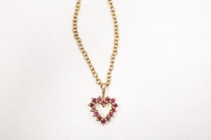 10K Ruby and Diamond Heart Pendant  [only 1 Diamond, 14 Rubies] on 1/20 12K 24 in. Chain