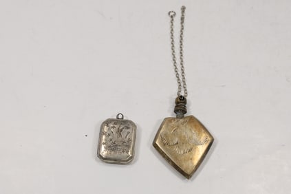 [2] Sterling Silver Perfumer 2 1/8 in. x 1 1/2 in. ; Sterling Silver Locket 1 1/4 in. x 7/8 in.