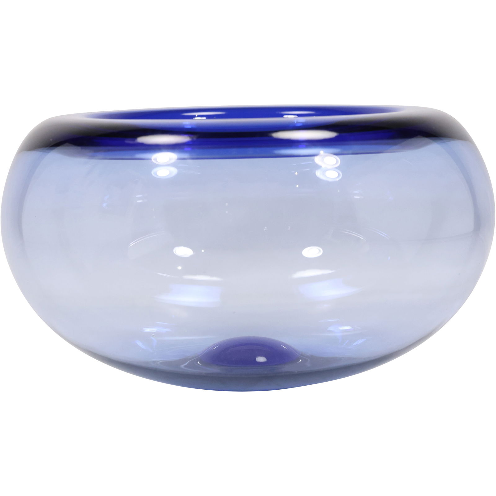 Holmegaard "Provence" or "Arne" series bowl designed by Per Lütken, 6 in. height x 9 in. wide: Holmegaard "Provence" or "Arne" series bowl designed by Per Lütken. This specific design, known for its mouth-blown sapphire blue glass, was created in 1955 for the Danish glass company Holmegaard. P