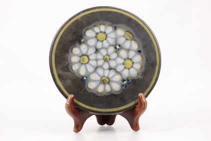 Denby Kismet Blue bread and butter plate, featuring a distinctive daisy-like floral design 7 in. d.