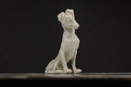 Porcelain Sculpture depicting a Greyhound or Whippet dog.  8 in. height x 4.5 in. wide