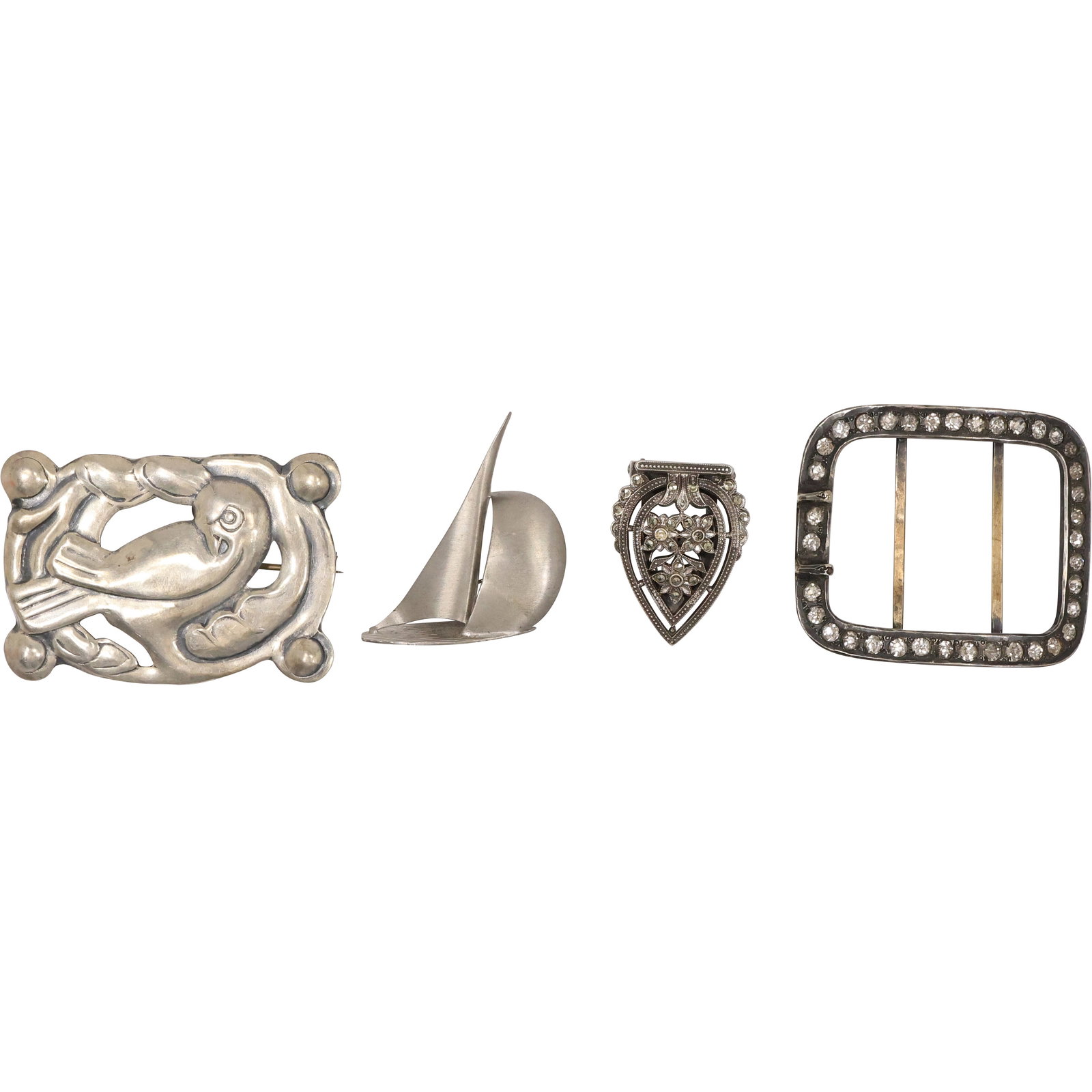 [4] Sterling Silver with CZ Buckle 2 in. x 1 3/4 in.; Sterling and Marcasites Scarf Clip 1 1/4 in. x: [4] Sterling Silver with CZ Buckle 2 in. x 1 3/4 in.; Sterling and Marcasites Scarf Clip 1 1/4 in. x 1 in.; Beau Sterling Sail Ship Pin 1 1/2 in. x 1 1/2 in.; Sterling Bird Pin 2 1/4 in. x 1 1/2 in.