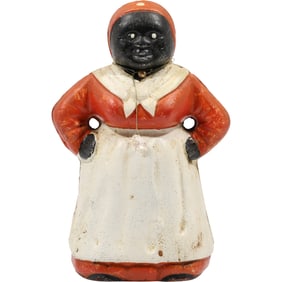 Cast Iron Figural Coin bank featuring the stereotypical "Aunt Jemima" in Original Paint Finish