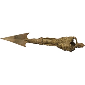 phurba, also known as a k?la, which is a three-sided ritual dagger used in Indo-Tibetan Buddhism