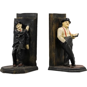 pair of vintage bookends featuring the comedic duo Laurel and Hardy.