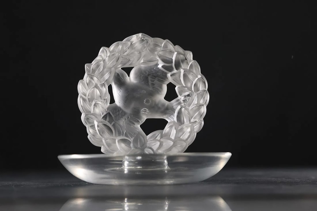 Signed LALIQUE FRANCE Crystal Frosted Glass 'Pax Dove Of Peace' In Wreath Ring Holder: " This item requires an appointment scheduled via email (donny@donnymaloneauctions.com) at least 24 hours before pick-up. Signed LALIQUE FRANCE Crystal Frosted Glass 'Pax Dove Of Peace' In Wreath Ring