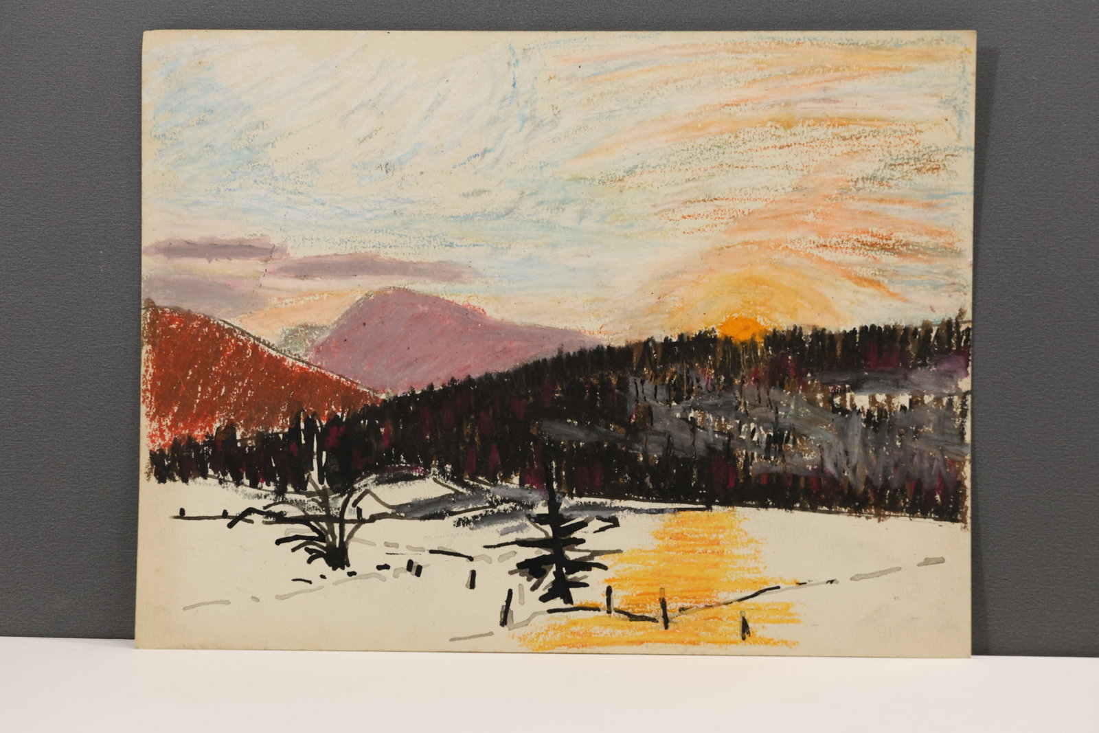 Robert Angeloch (1922–2011) Winter Sunset with Mountains Crayon Drawing, 1956, 9 × 12 in.: All descriptions were generated using AI technology and have not been reviewed or verified by a human. All items are sold as-is, where-is. It is the buyer’s responsibility to preview, examine, and a