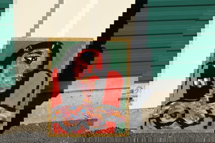 Tom Pulgini (b. 1965) – Seated Nude in Red Chair – Oil on Board