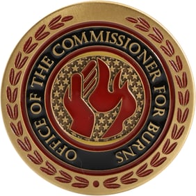 75 Challenge Coins associated with the Office of the Commissioner for Burns.