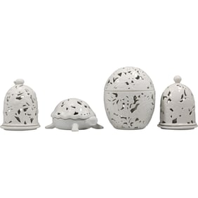 Set of Four White Openwork Ceramic Candle Holders