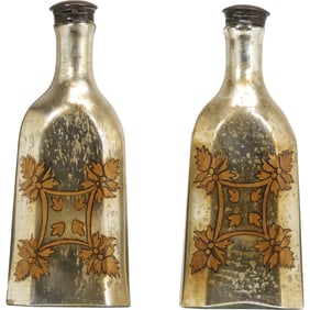 Pair of French mercury glass decanters with gilt floral decoration