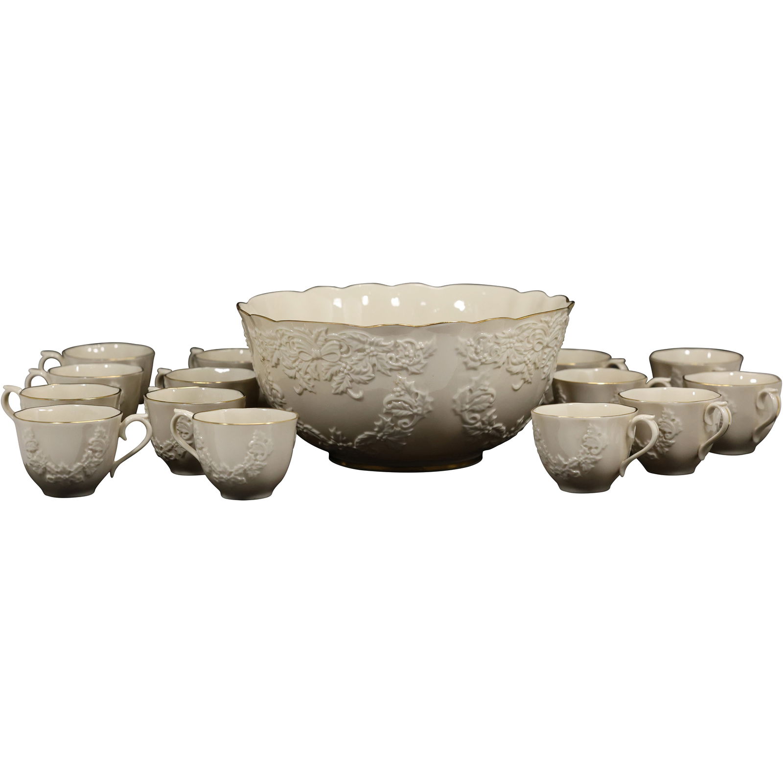 Lenox Holiday Hostess punch bowl set featuring a punch bowl and 14 cups in ivory porcelain: Lenox Holiday Hostess punch bowl set featuring a punch bowl and 14 cups in ivory porcelain with gold trim and an embossed holly and berry pattern. size: 6h 12w S:D