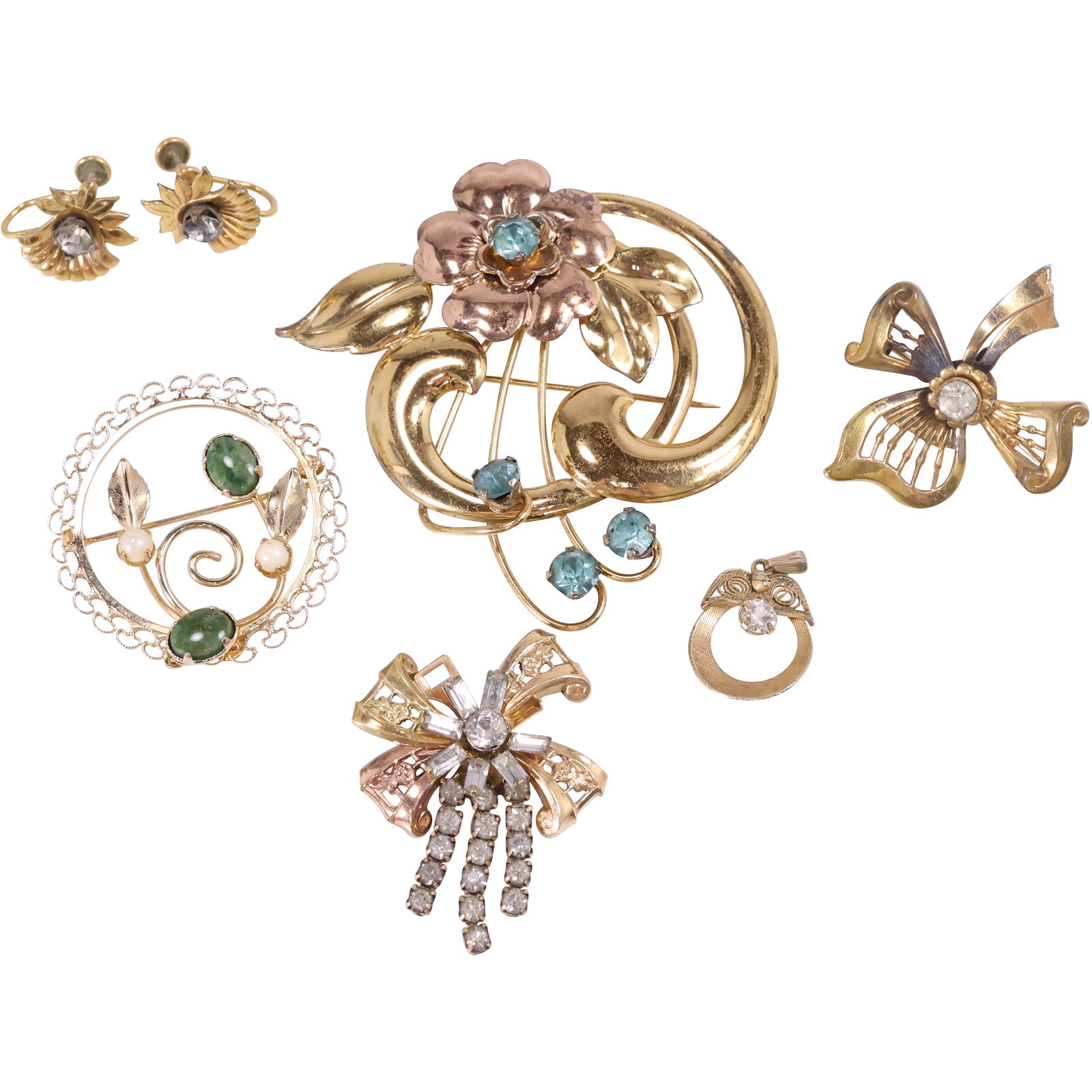 7 Assorted 12K Gold Filled: 1940s Large Pin with Blue Rhinestones 2 3/4 in. dia.; 12K GF DDR 1950s: 7 Assorted 12K Gold Filled: 1940s Large Pin with Blue Rhinestones 2 3/4 in. dia.; 12K GF DDR 1950sPin with 2 Green Stones and 1 Red Pearl; 12K GF 1940s Bow Pin 1 1/2 in; 12K GF Iskin Rhinestone Pin 1 