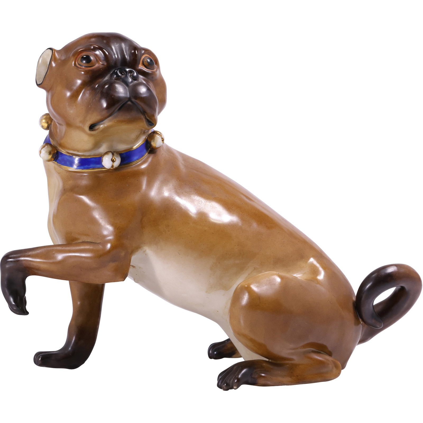 Meissen Porcelain Pug Dog Figurine: Meissen porcelain pug figurine, finely hand-painted with naturalistic brown and cream tones. The dog is depicted seated with one paw raised, featuring expressive eyes, a curled tail, and a blue collar