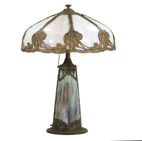 Antique Art Nouveau Blue Curved Slag Glass Lamp with Bronzed Metal Hardware and Lighted Base.