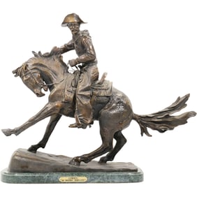 bronze sculpture titled The Cowboy after the American artist Frederic Remington. 21 in. height