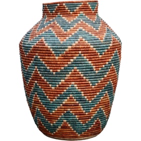 handwoven Cobra basket with a chevron pattern. 30 inches height x 24 inches wide