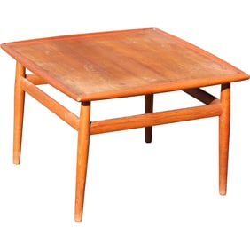 Grete Jalk teak coffee table produced by Glostrup in Denmark during the 1960s; 19 in. x 28 in. x 28