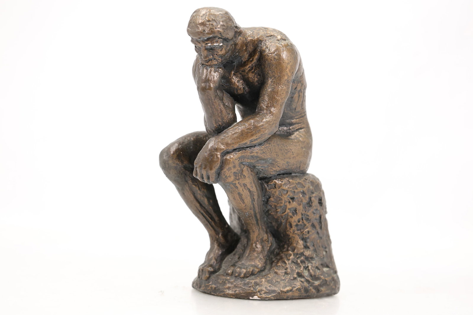 Rodin the Thinker Austin Prod Sculpture: Rodin the Thinker Austin Prod Sculpture size: 9h 5.5w S:C** Important Auction information:**** All lot descriptions in this auction were generated using artificial intelligence piloting innovative tec