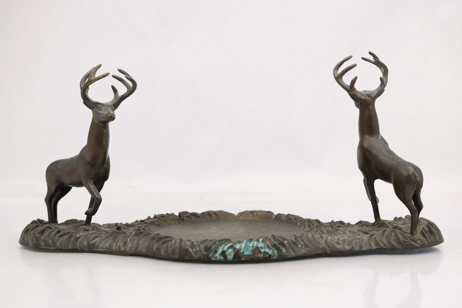 Farmhouse Vintage Bronze Deer Sculpture Centerpiece: Farmhouse Vintage Bronze Deer Sculpture Centerpiece size: 8h 17w 8w S:A** Important Auction information:**** All lot descriptions in this auction were generated using artificial intelligence piloting 