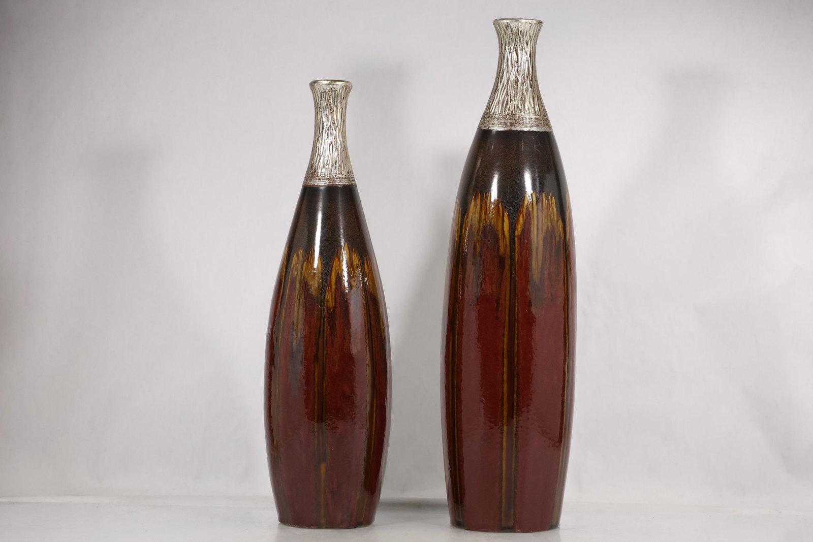 Pair of Tall Modern Pottery Vases with a Red Brown Drip Glaze (1 of 14)